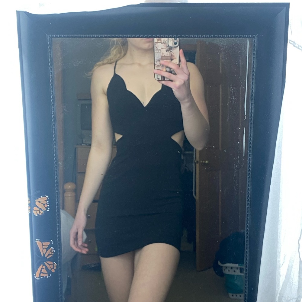 Mini black dress with cut-outs